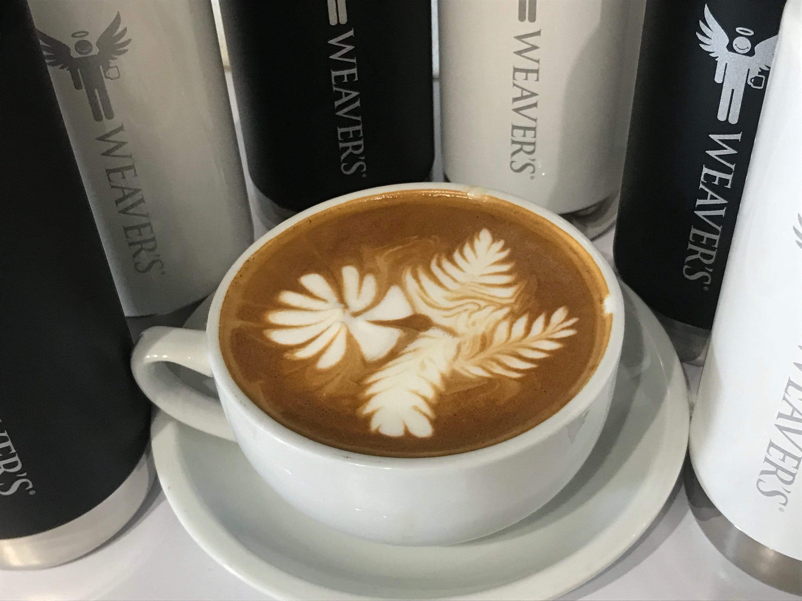 weaverscoffee.mom Latte Art of a palm tree made with Kenya AA Coffee.