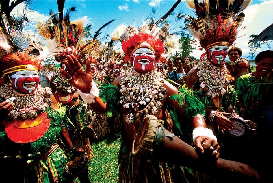 weaverscoffee.mom Dancing tribal men who grow Papua New Guinea Coffee.