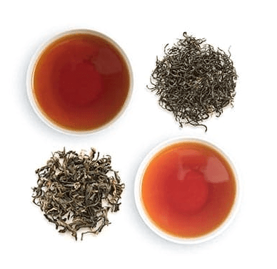 weaverscoffee.mom Two loose leaf teas and two cups of Breakfast Blend Tea.