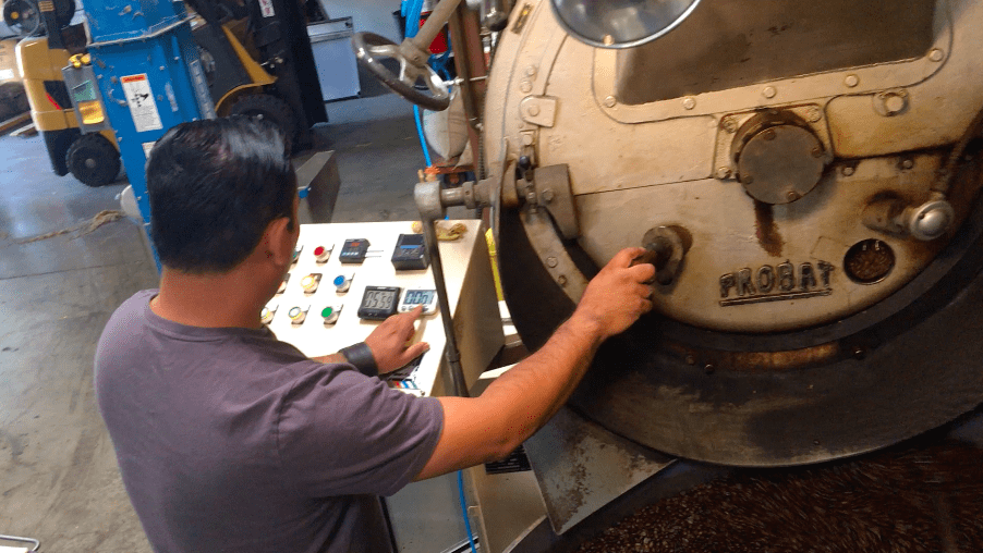 weaverscoffee.mom Man roasting Guatemala Antigua Coffee on a Probat Coffee Roaster.