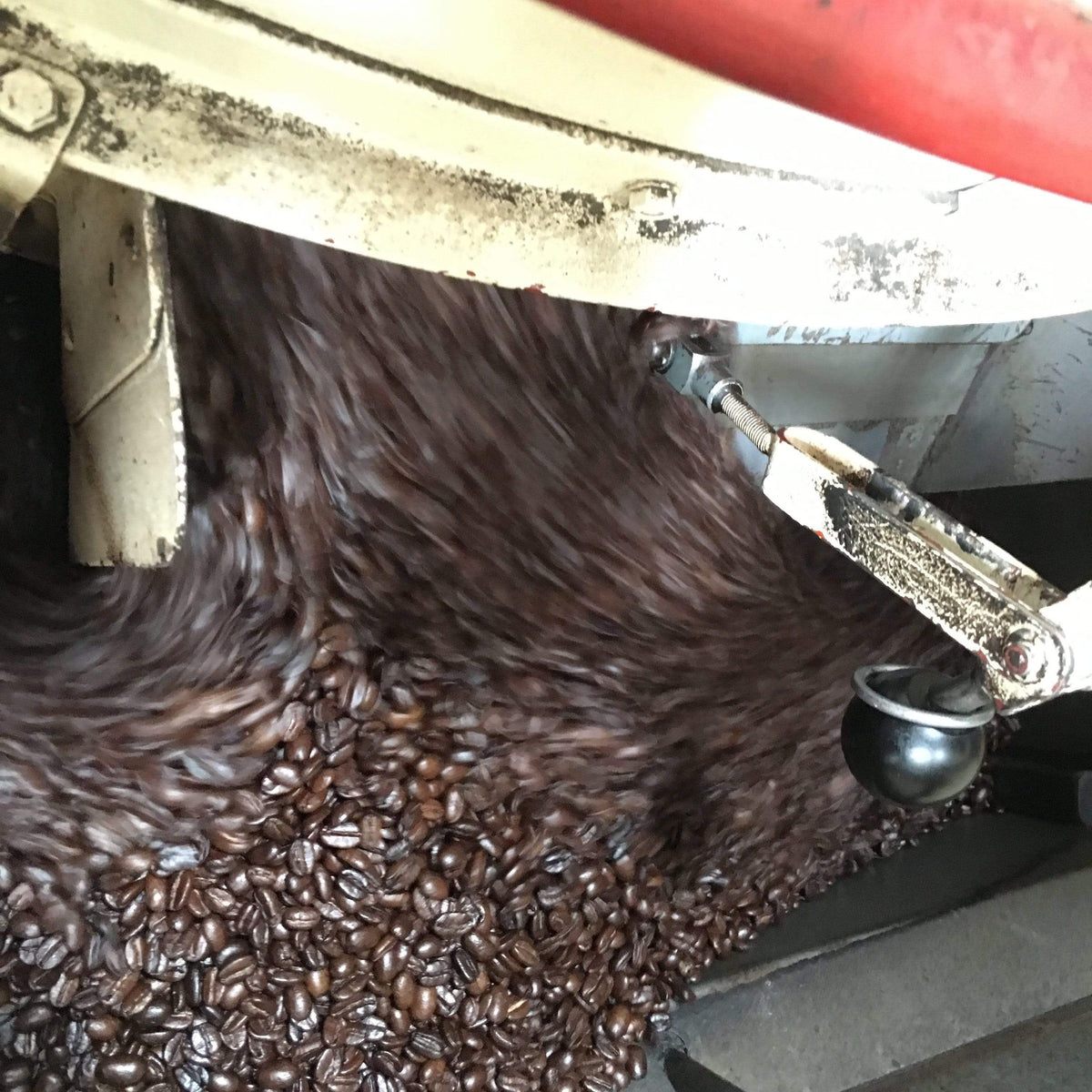 weaverscoffee.mom Fresh roasted coffee in the coffee roaster filled with Aged Mocha Java Coffee.