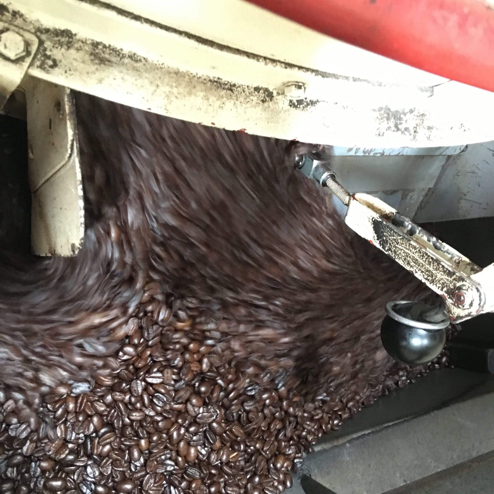 weaverscoffee.mom Fresh roasted coffee in the coffee roaster filled with Aged Mocha Java Coffee.